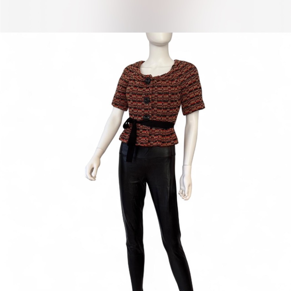 Elevenses - short sleeved peplum style jacket paired w/faux, leather leggings.